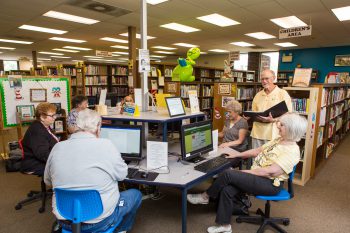 Harvey Schoenman with students at Community Library of Castle Shannon