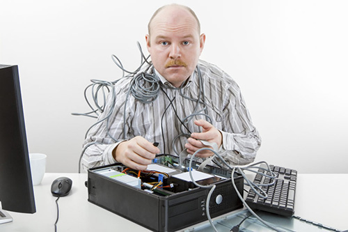 Technician repairing a computer